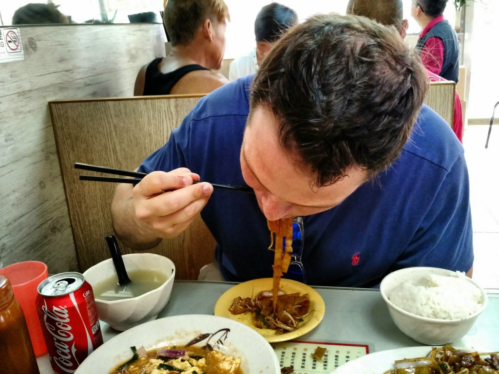 Eating chow fun. I'm getting better with chopsticks.
